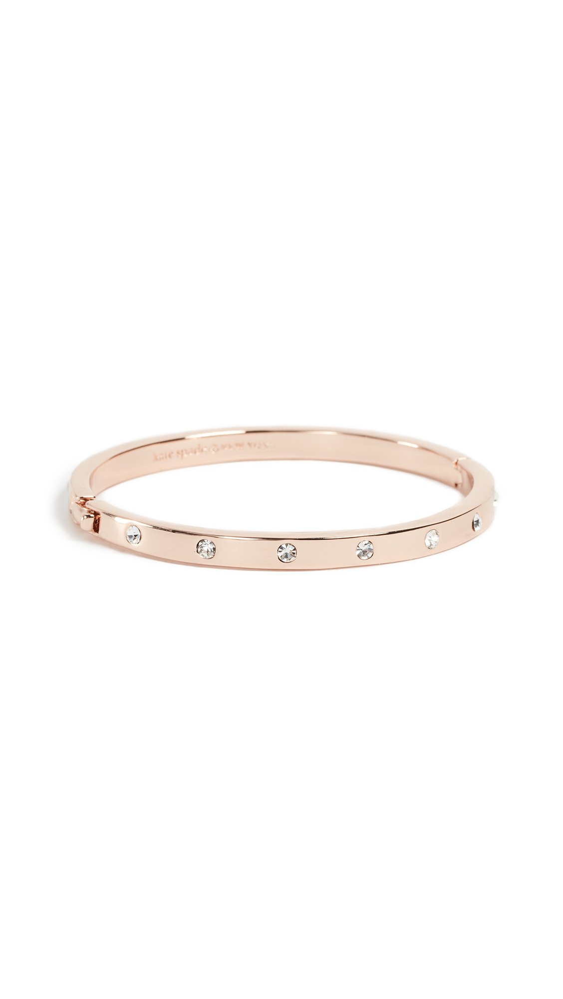 Kate Spade New York placed in metal stone hinged bracelet