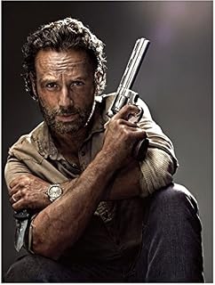 wd Rick Grimes with gun in one hand and knife in the other 8 x 10 Inch Photo