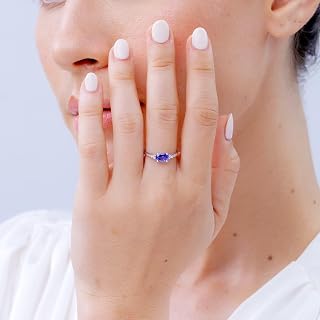 Angara Natural Horizontally Set Oval Tanzanite Solitaire Ring with Trio Diamond Accents in Sterling Silver/14K Solid Gold for Women | December Birthstone Jewellery for Her | Wedding | Anniversary