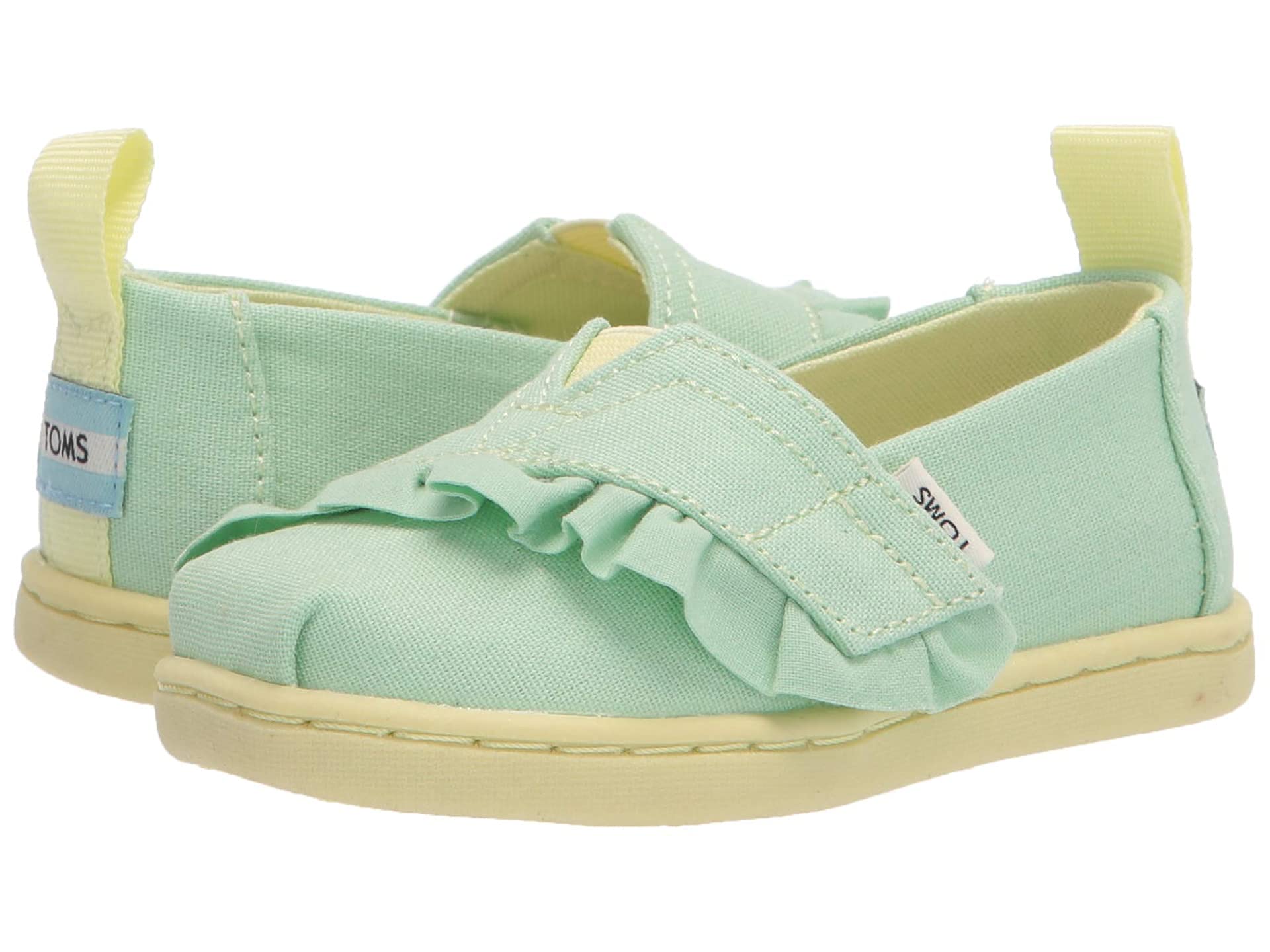 TOMS Girls Alpargata Loafer Flat, Pastel Green Canvas/Ruffle, 4 Little Kid