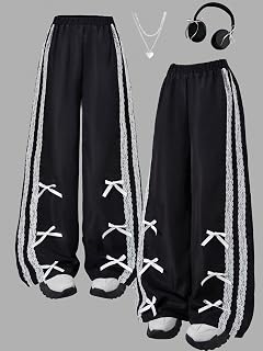 These girls fashion casual black pants are decorated with lace webbing and bow tie on both sides of the legs