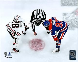 Connor Bedard Blackhawks vs Connor McDavid Oilers Faceoff Unsigned Photograph - December 12, 2023-8x10